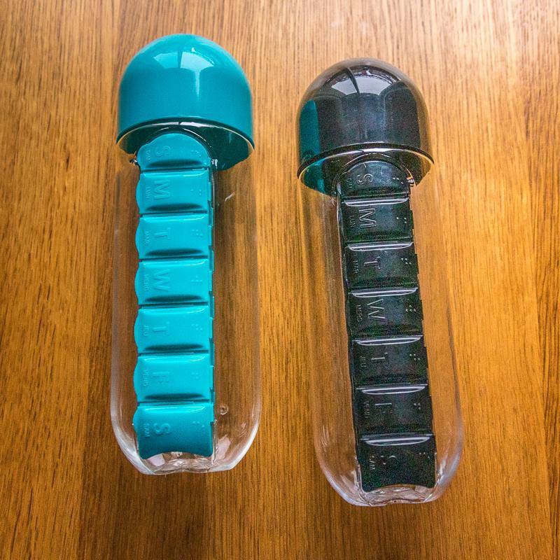 https://myecoboutique.com/cdn/shop/products/Water-Bottle-With-Daily-Pill-Box-9.jpg?v=1615321942